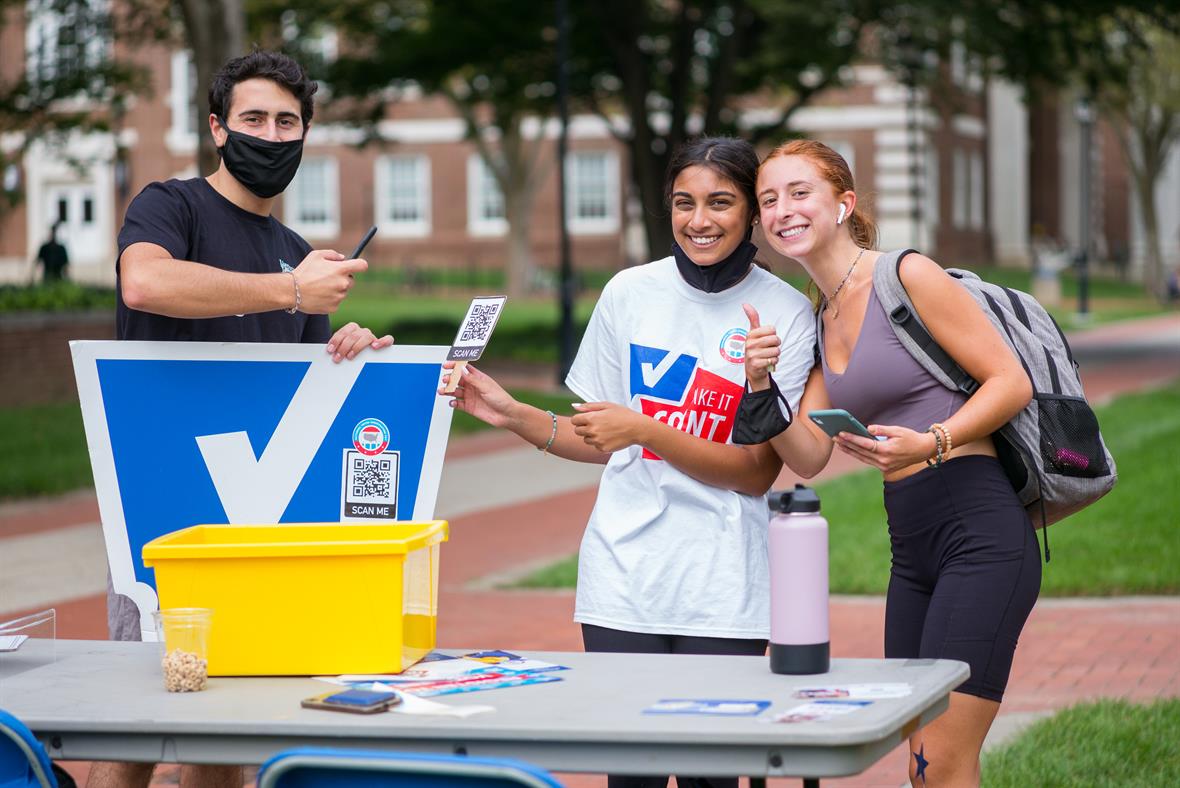 Photo by Evan Krape. University of Delaware students show their civic pride during National Voter Registration Day, which took place on the Green on September 28, 2021.